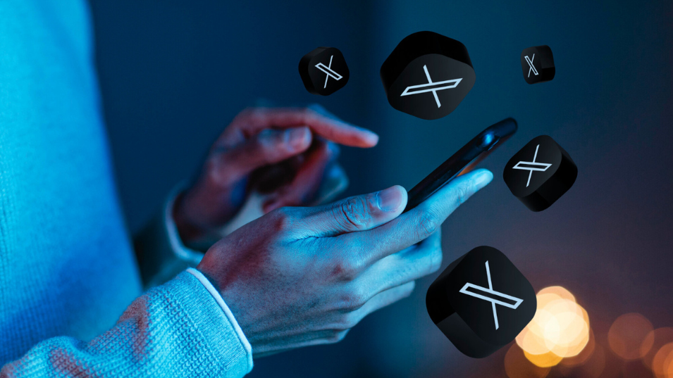 What Businesses Should Know About Twitter or X. Phone With X Logos